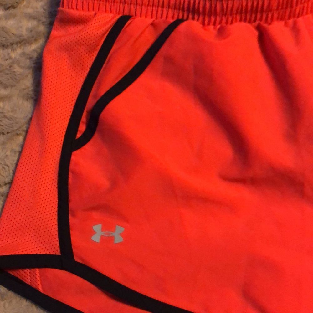 Under Armour athletic running shorts. Redish orange color. - Picture 2 of 4